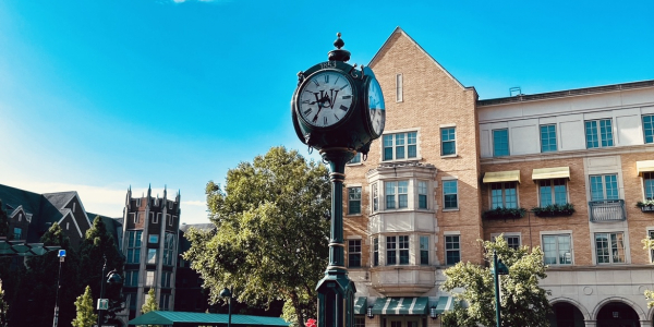 WashU clocktower with blue sky 