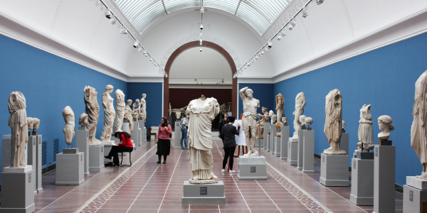 greek and roman statues on display in museum